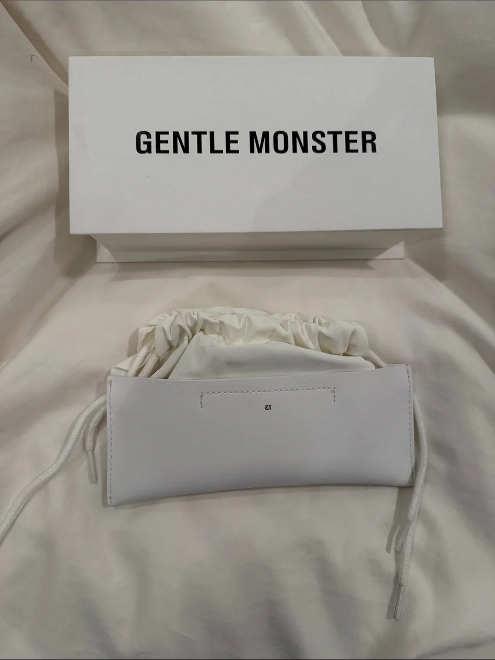 GENTLE MONSTER White Drawstring Sunglass Pouch